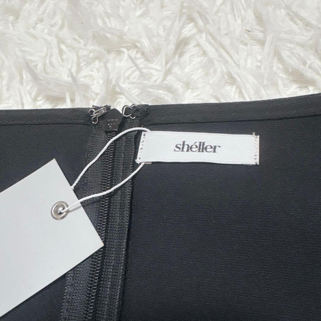 【新品未使用】sheller シェリエ　サイドテール ペプラムトップス　ブラック