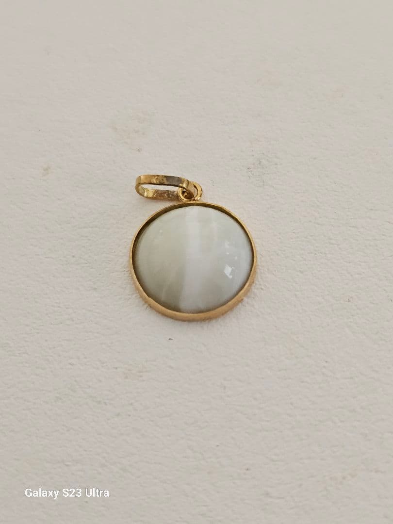 糸魚川翡翠キャツアイ１８金ペンダント１０mm