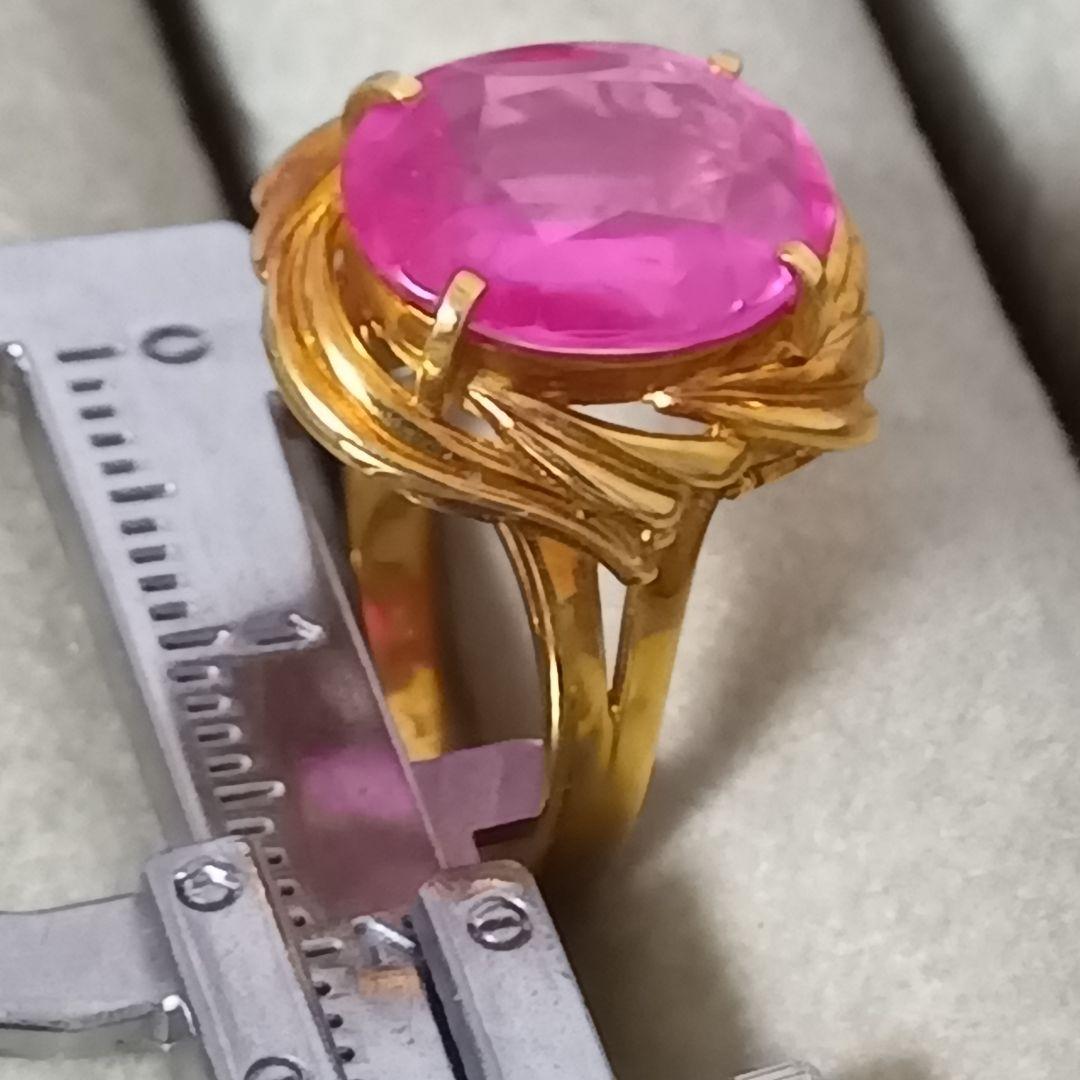 ピンク色おたからや聞くルビーかストーンリングK１８内径約１６mm重量合計４.５g