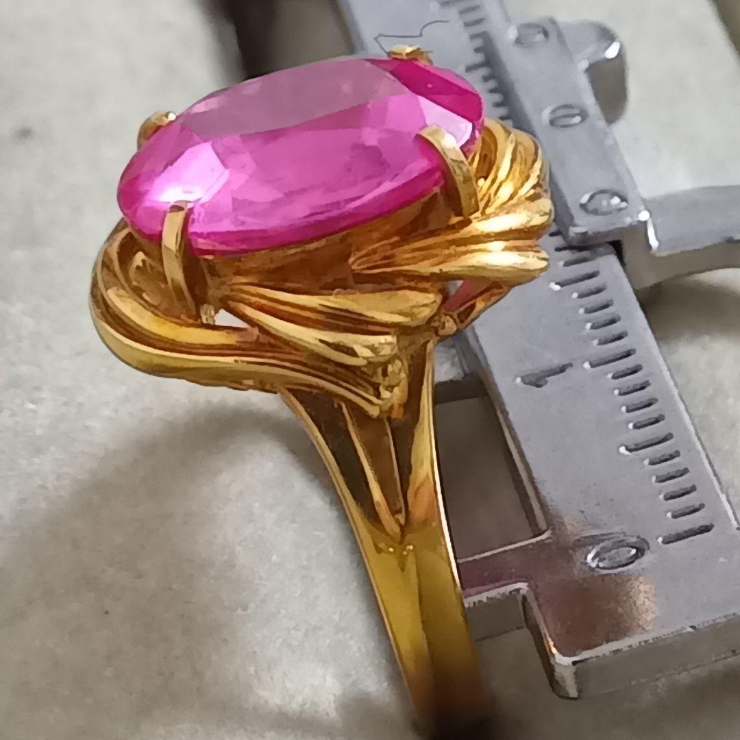 ピンク色おたからや聞くルビーかストーンリングK１８内径約１６mm重量合計４.５g