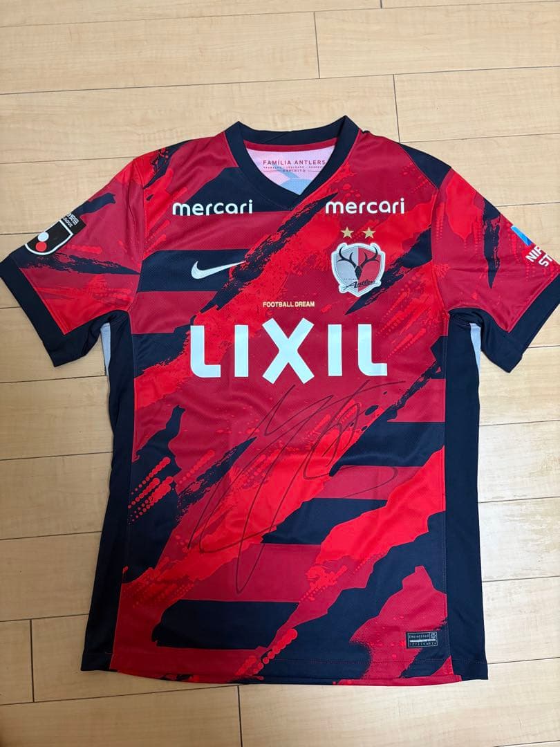 鹿島アントラーズ サイン入りユニフォーム - メルカリ