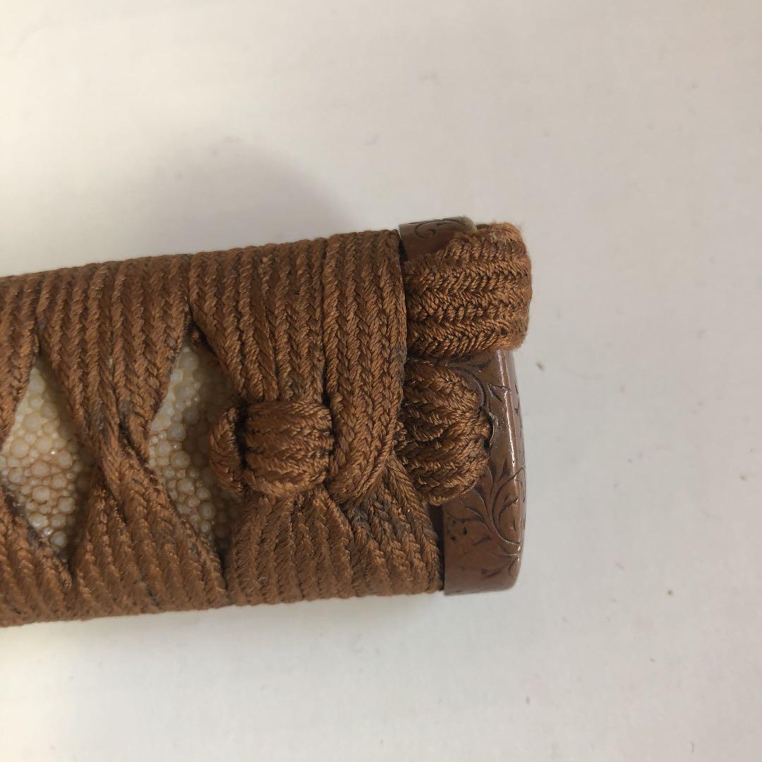 刀剣の柄　獅子目貫　23.6cm