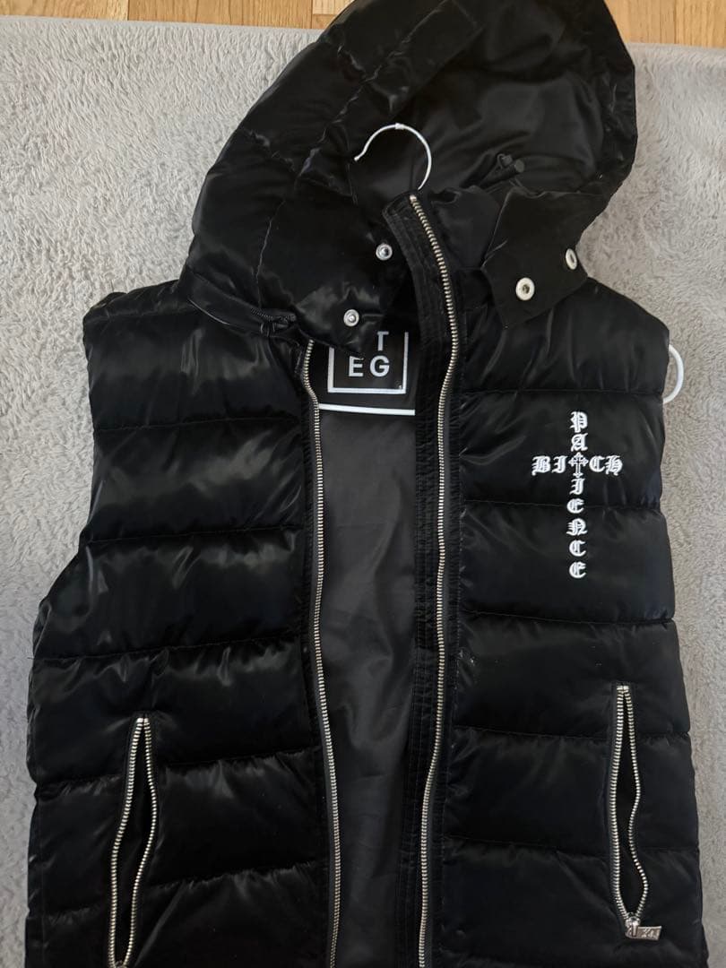 アダムスジャグラーダウンベスト