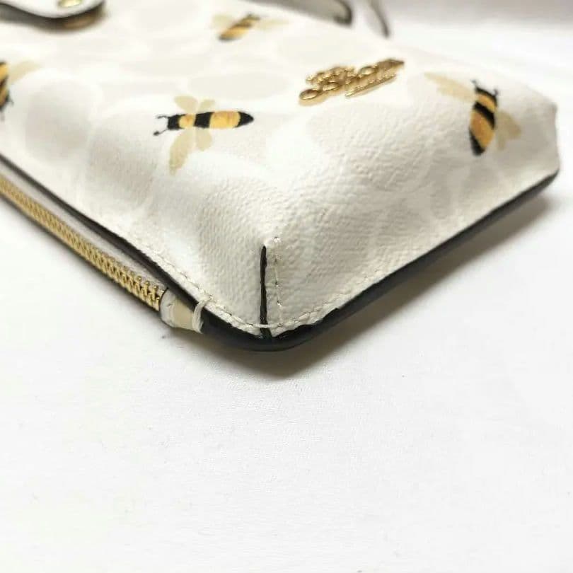 美品 COACH フォーンクロスボディ 蜂柄 スマホショルダー d27