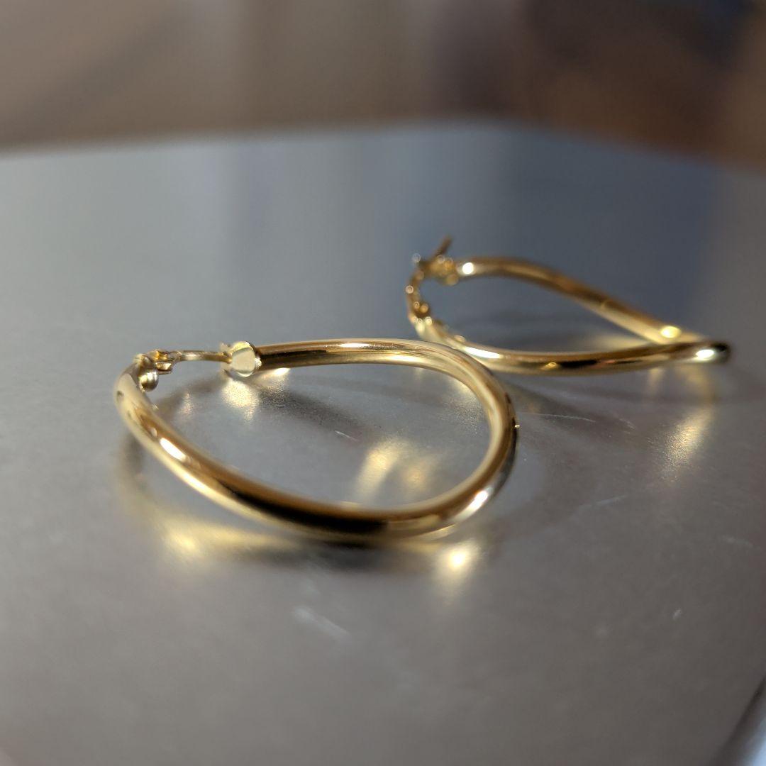 ピアス　UNOAERRE　750　YG　スナップ　ウェーブ　2.59g