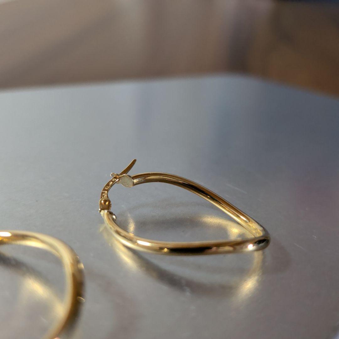 ピアス　UNOAERRE　750　YG　スナップ　ウェーブ　2.59g