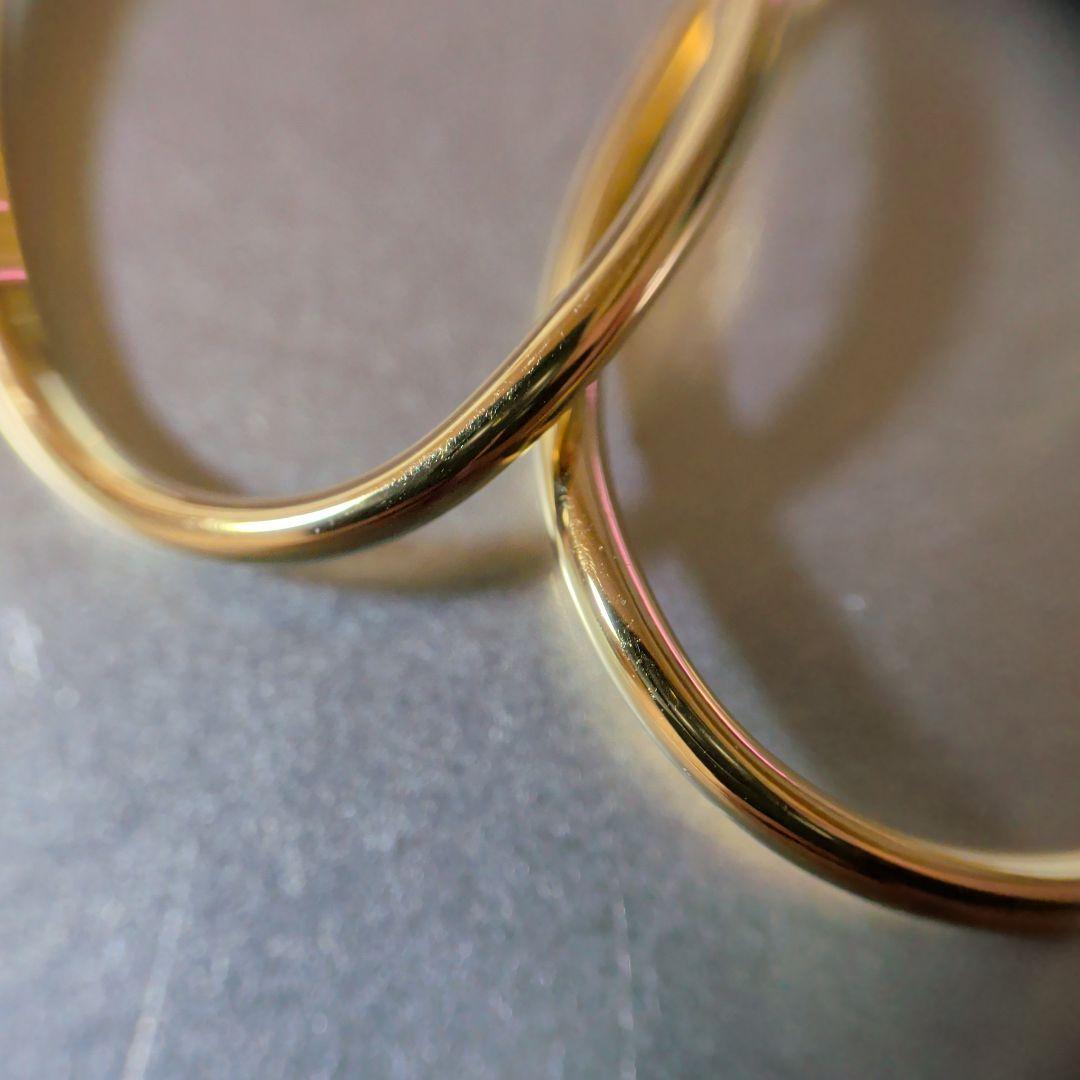 ピアス　UNOAERRE　750　YG　スナップ　ウェーブ　2.59g