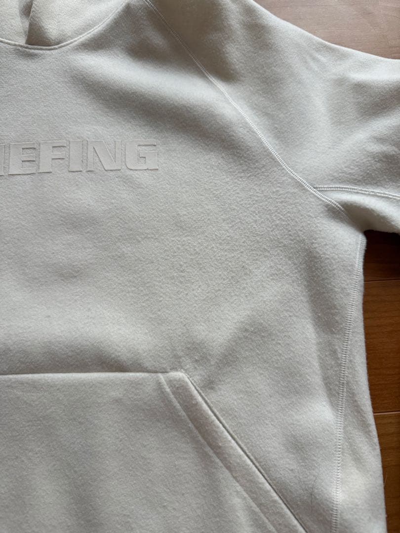 BRIEFING フード付きトレーナー