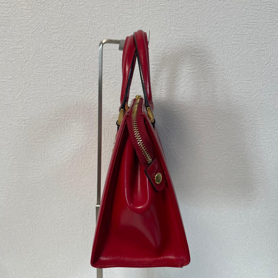 ジャンニヴェルサーチ ハンドバッグ 赤 レザー チャーム付
