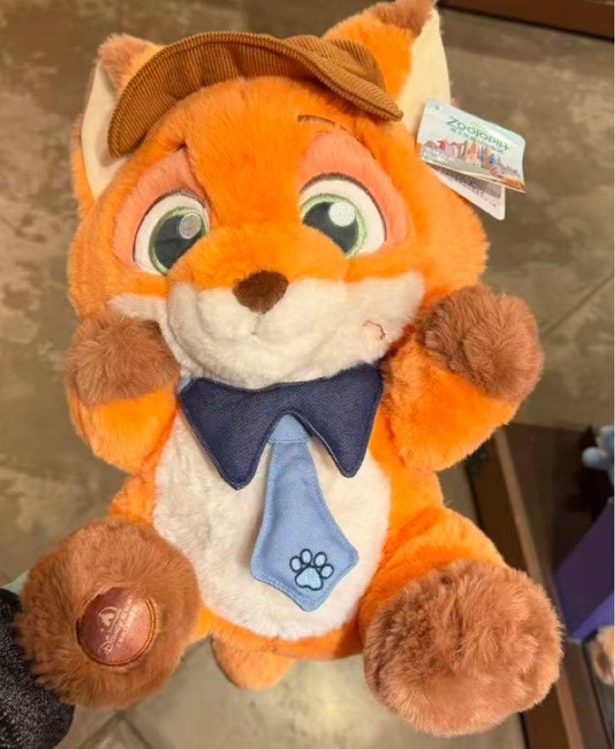 上海ディズニー 小さい旅人 ズートピア ニック ぬいぐるみ - メルカリ