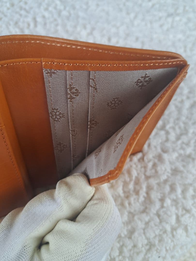 新品【ダコタ】アロマティコ がま口二つ折り財布　牛革 本革【Dakota】