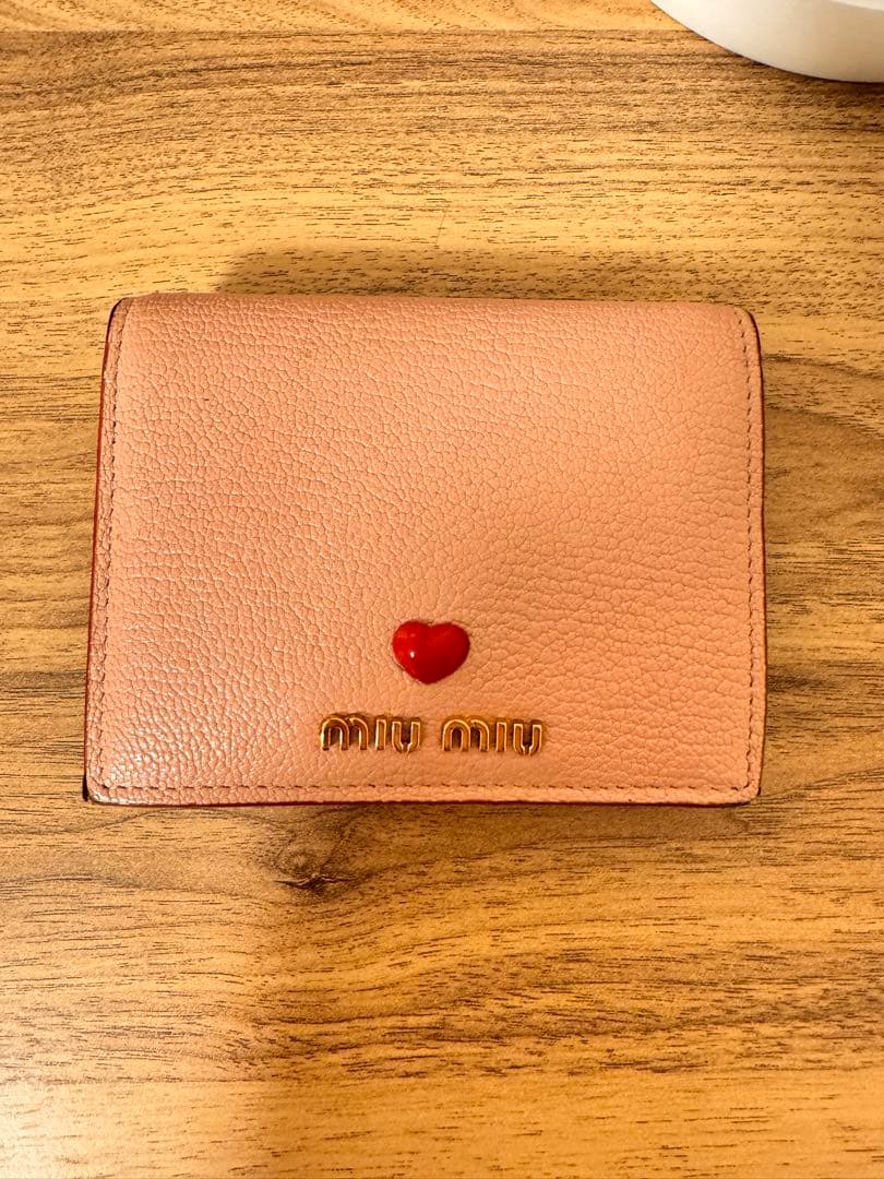 MIU MIU 二つ折り財布 ピンク miu miu（ミュウミュウ） miu miu財布 Wホック二つ折り財布 NAPPA