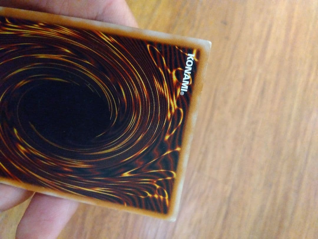 青眼の白龍 ブルーアイズホワイトドラゴン　レリーフ　SM-51　⑧微青艶　枠ズレ