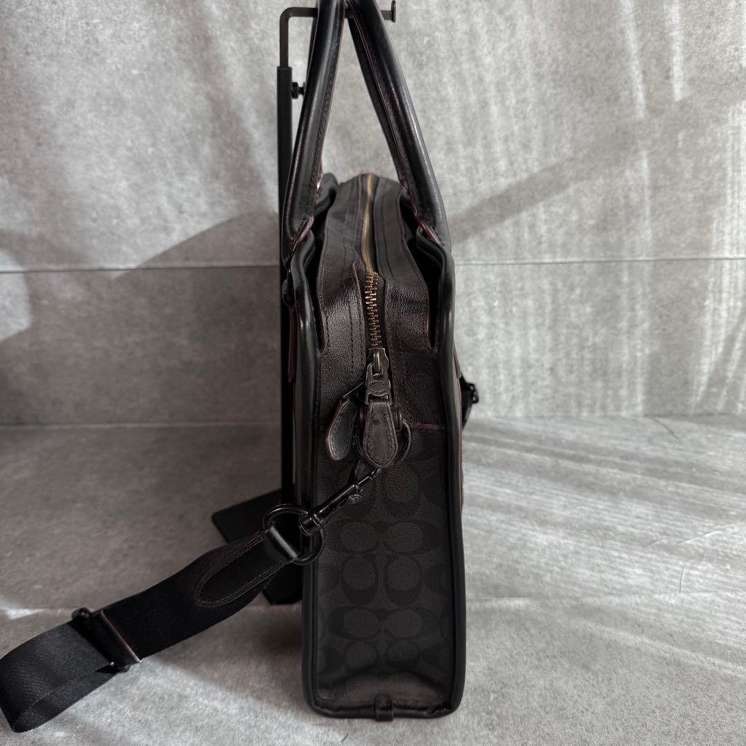 良品 コーチ ビジネスバッグ A4収納可 シグネチャー F23212