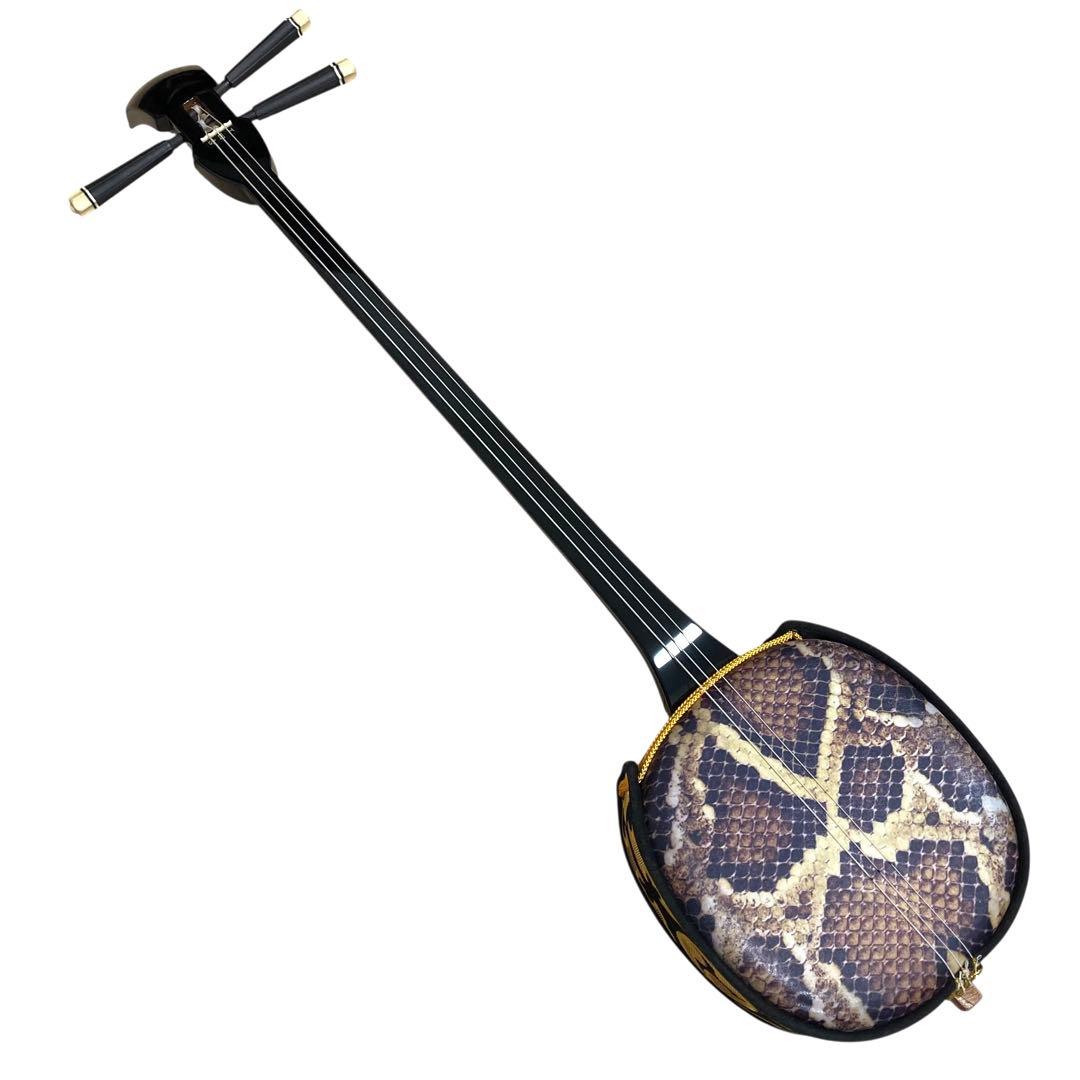 ✨付属品多数✨ 沖縄 三線 特上 人工皮革 蛇柄 ソフトケースや替弦など付属！