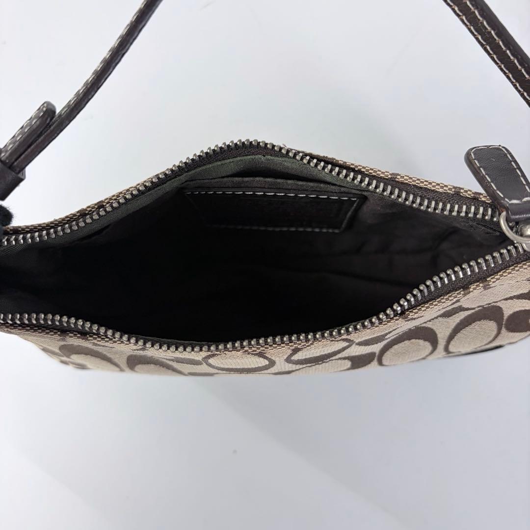 コーチ アクセサリーポーチaccessory pouch6094チャームブラウン