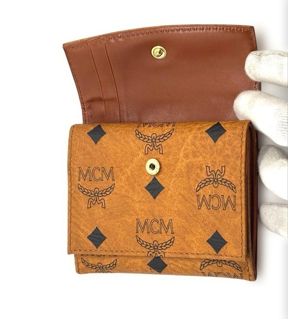 新品・未使用MCM エムシーエム 三つ折り財布 レザーブラウンロゴ入り
