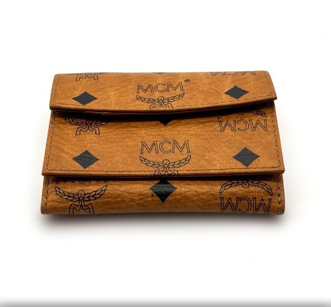 新品・未使用MCM エムシーエム 三つ折り財布 レザーブラウンロゴ入り