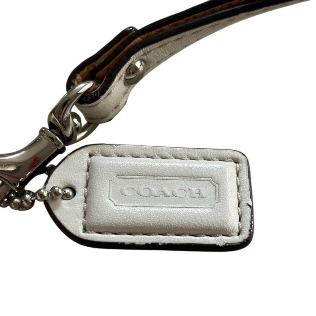 コーチ　がま口 花刺繍 蜂 キャンバス レザー ポーチ