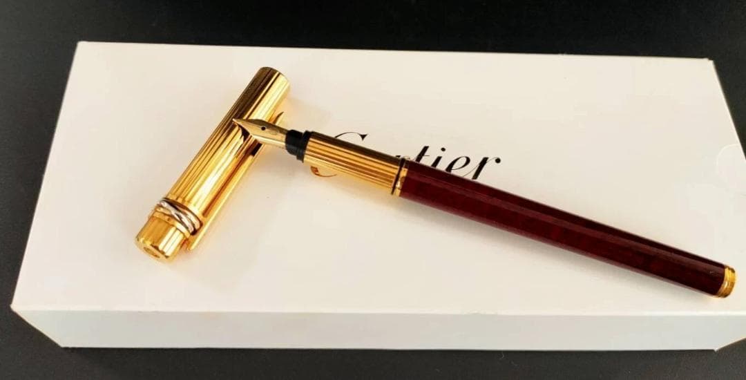 ヴィンテージ Cartier カルティエ トリニティ 万年筆 ボルドー 18K 80s カルティエ トリニティ Cartier （細字） 18K 02490 | 川口明弘の