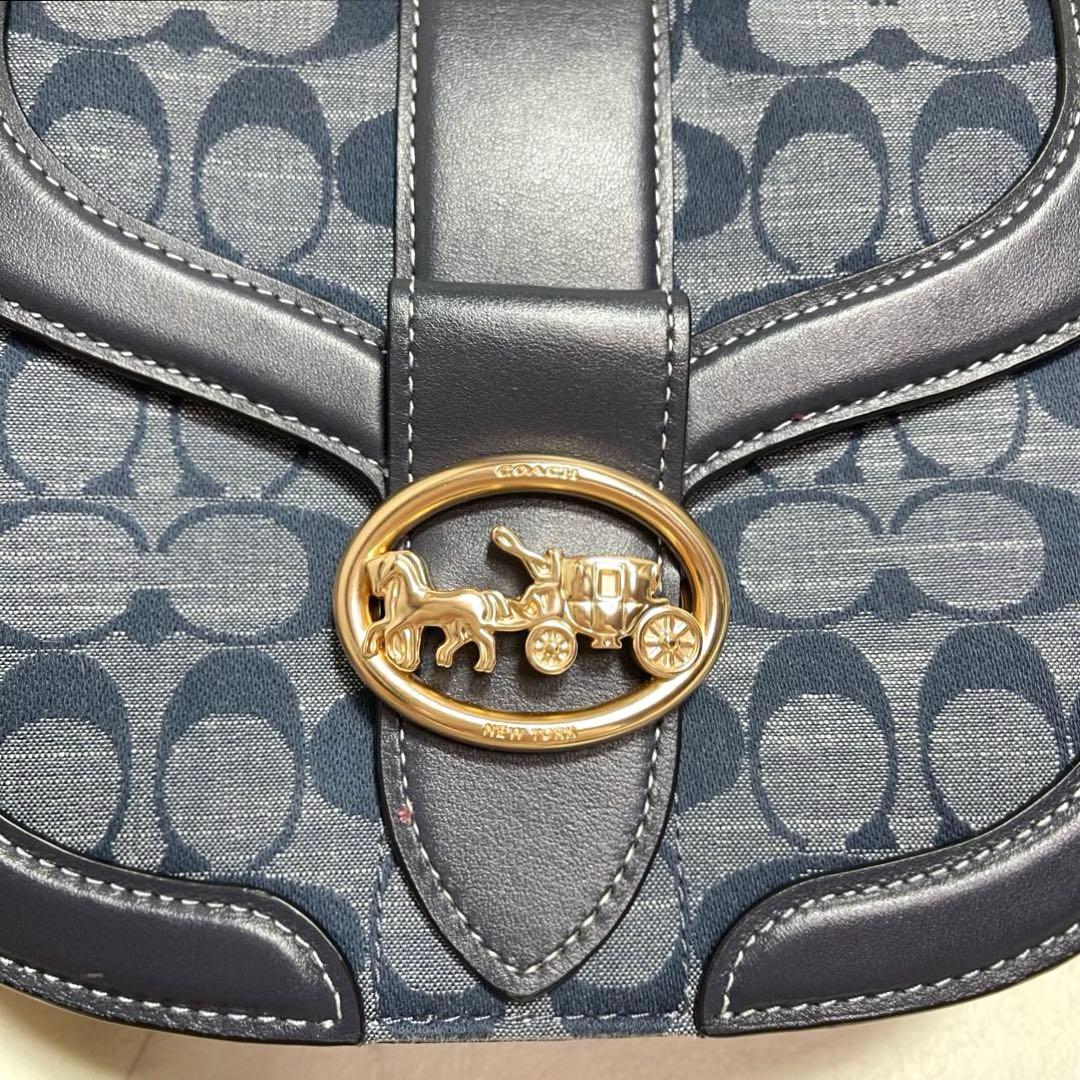 マイメロ✨コーチ ショルダーバッグ ジョージー サドルバッグ シグネチャー