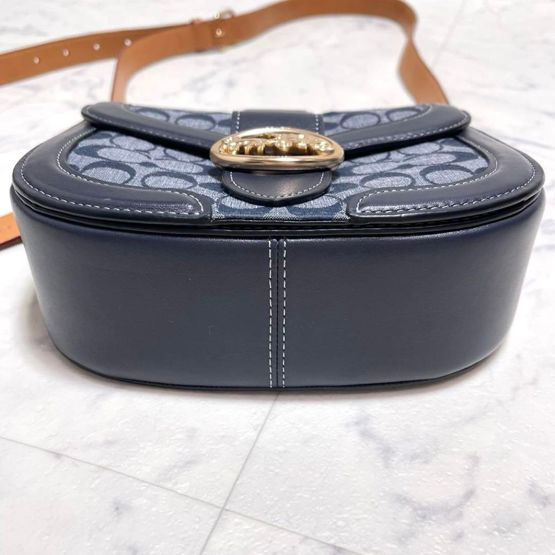 マイメロ✨コーチ ショルダーバッグ ジョージー サドルバッグ シグネチャー