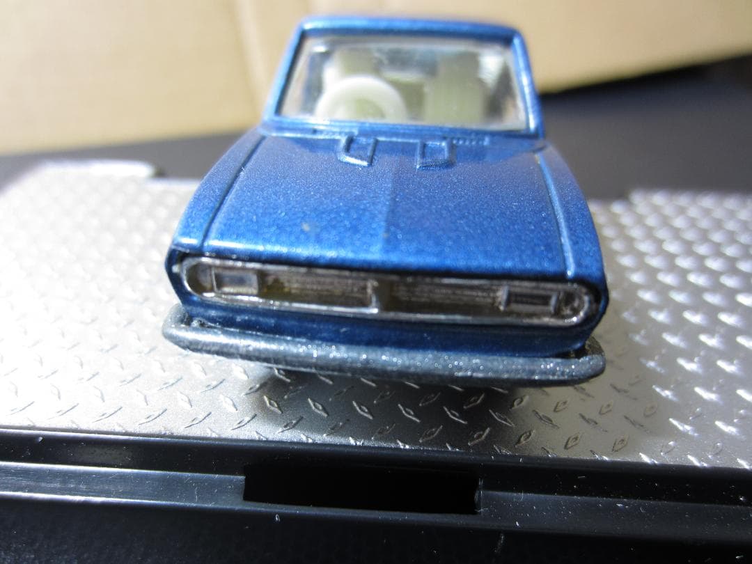 香港トミカ】マツダ カペラ2ドアクーペ／青／グリル造型あり - メルカリ