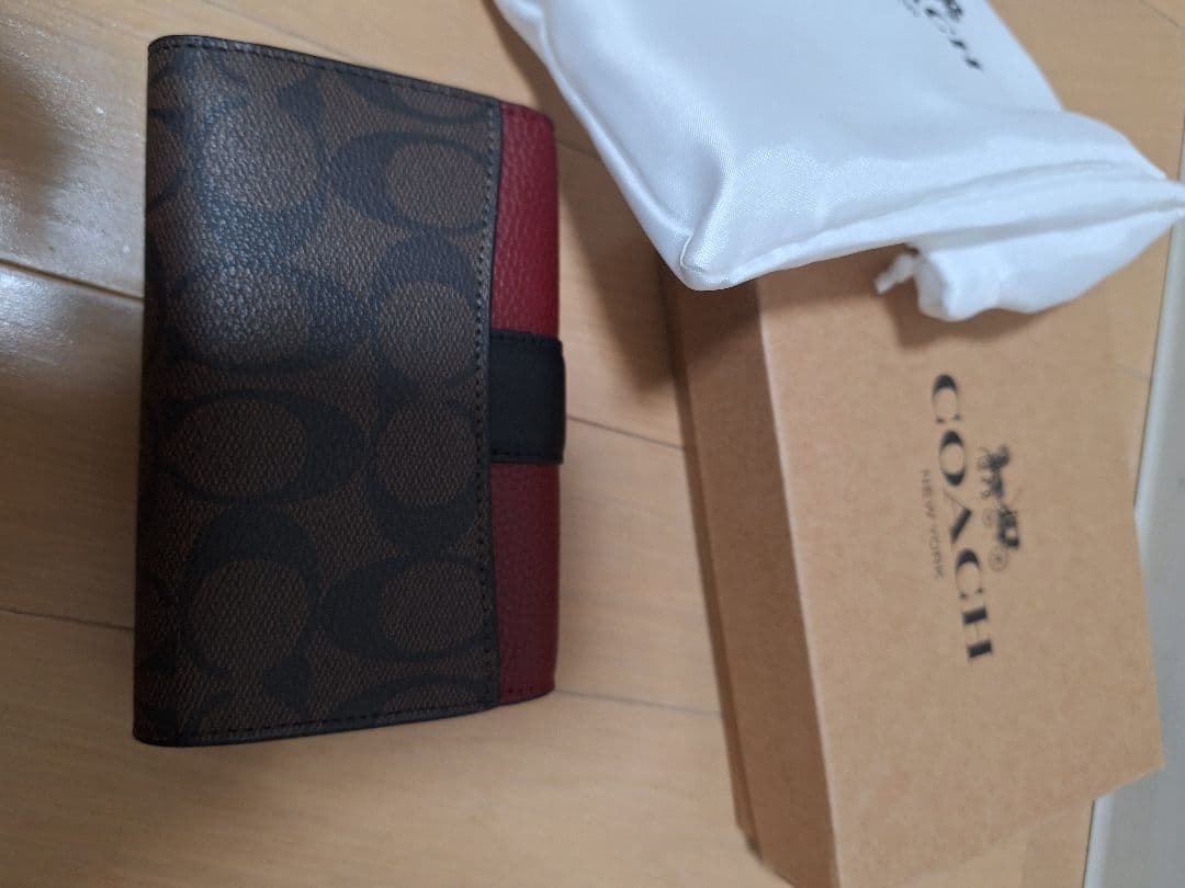 新品未使用　COACH 　折り財布