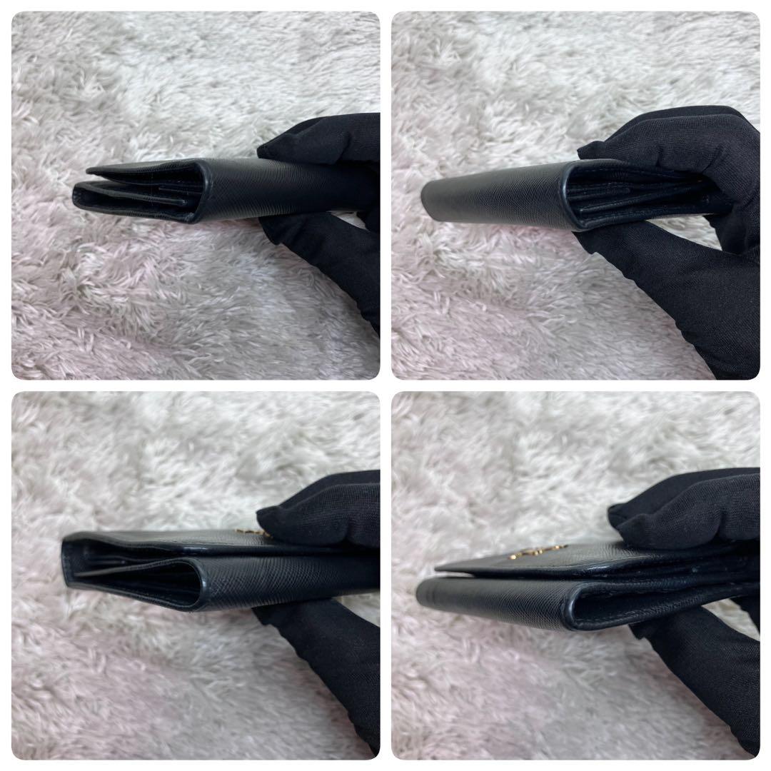 美品✨PRADA サフィアーノ メタルロゴ 二つ折り財布 フラップ ブラック