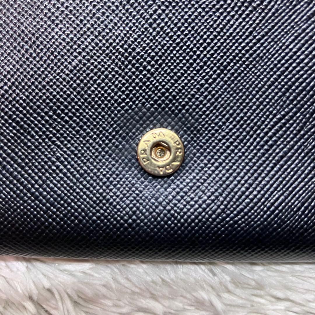 美品✨PRADA サフィアーノ メタルロゴ 二つ折り財布 フラップ ブラック