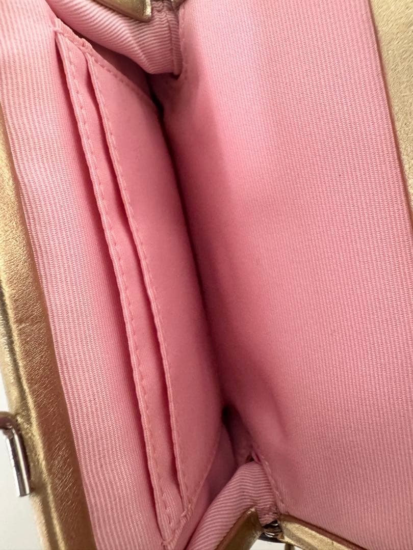 COACH がま口　キスロック　クラッチ　ゴールドラメ　コーチ