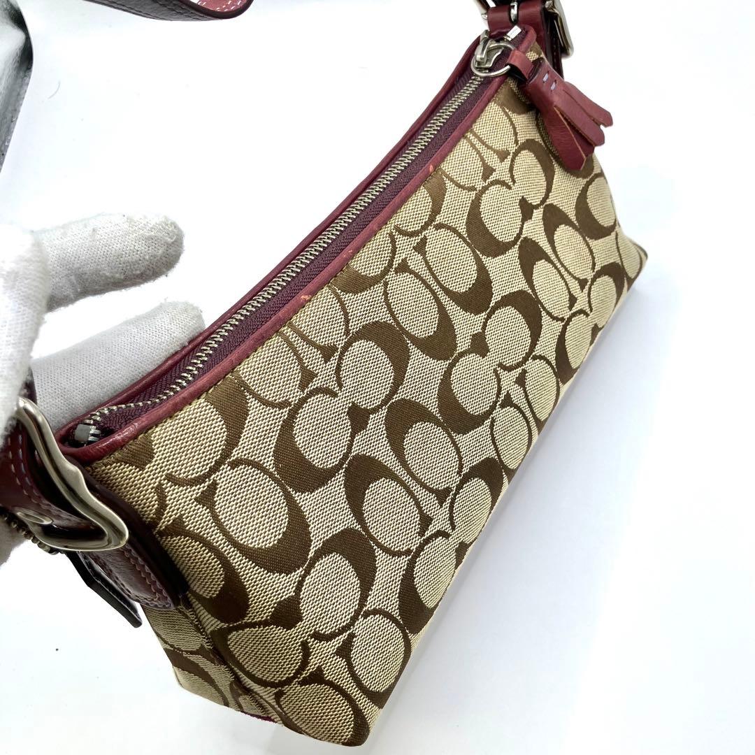 【美品】COACH コーチ ハンドバッグ アクセサリーポーチ シグネチャー　紫