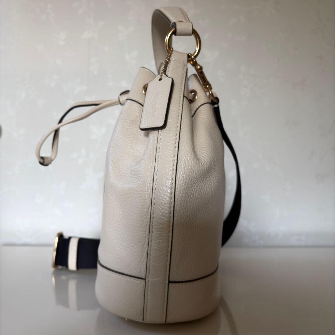 コーチ デンプシー ショルダーバッグ 巾着 2way レザー アイボリー