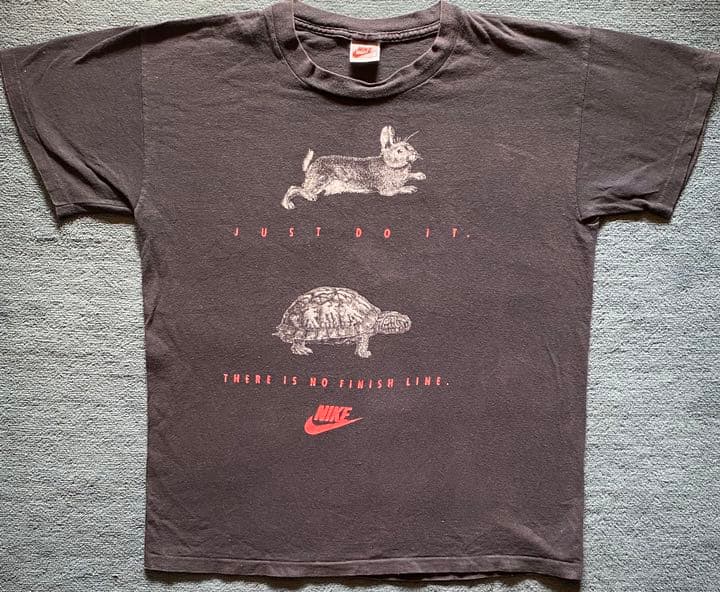 激レア ON BOOK物】90sビンテージナイキ Tシャツ 銀タグ ウサギと亀