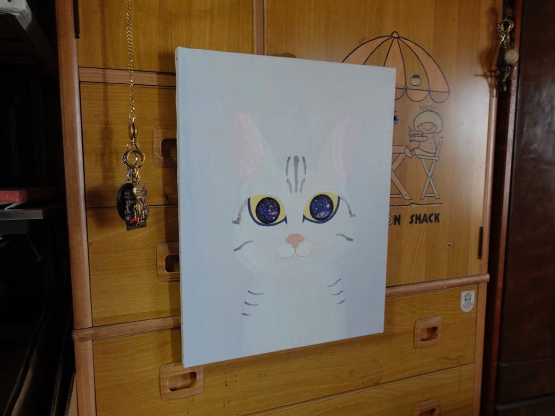 『まる子』　宇宙の目を持つ猫の油絵