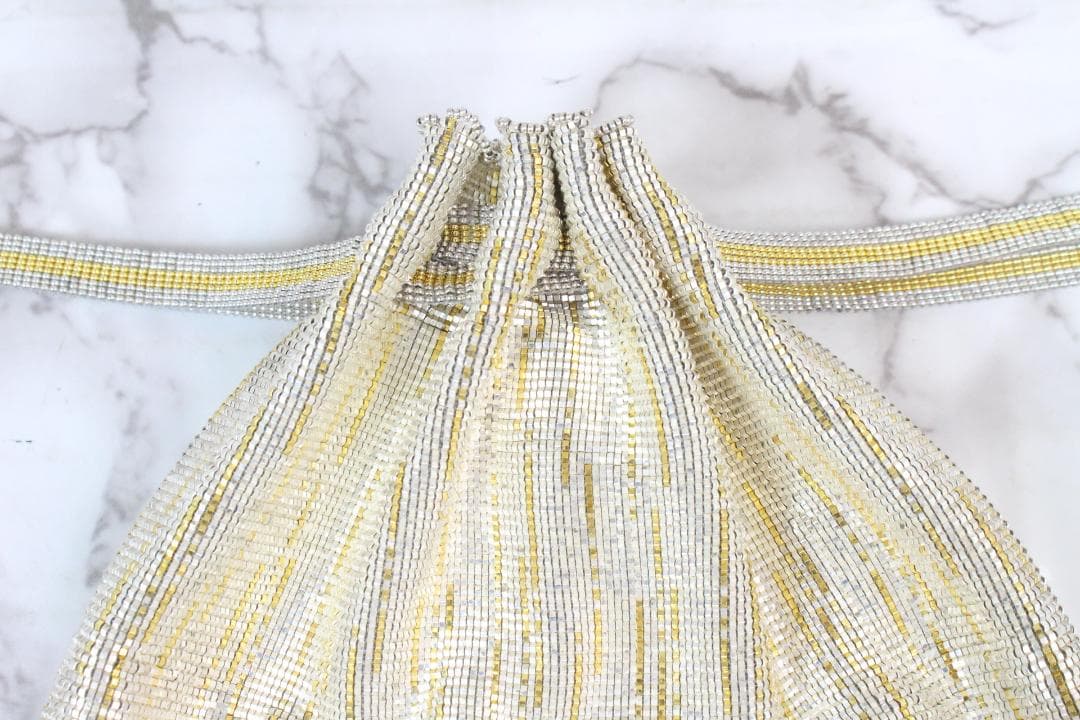 ♡Karat キャラット メタルビーズバック 巾着 ポーチ ゴールド系 ケース付