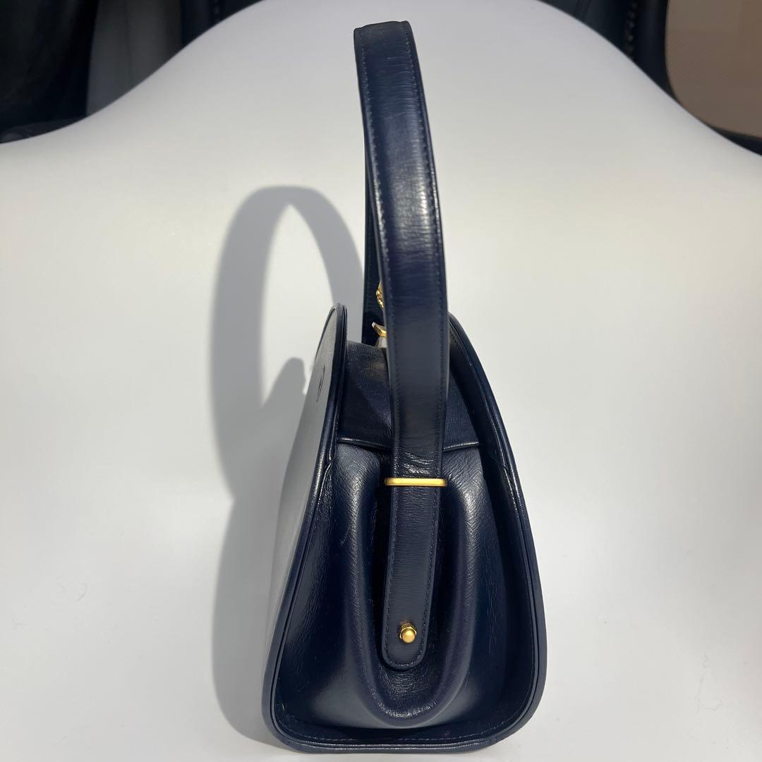 Mila schon ミラショーン 丸型 パーティーバッグ レザー 巾着