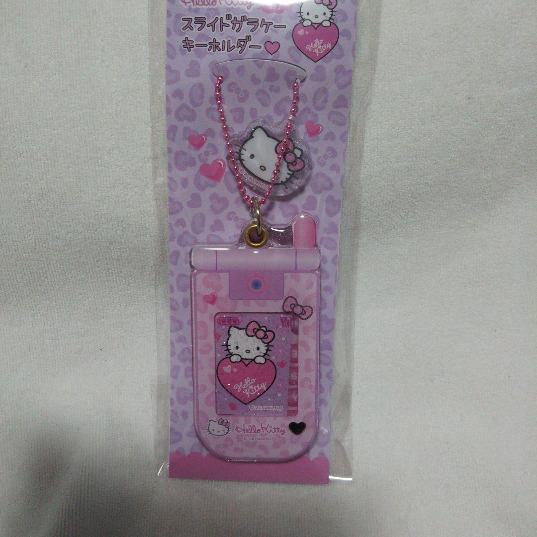 ハローキティ スライドガラケーキーホルダー ヒョウ柄ピンク - メルカリ