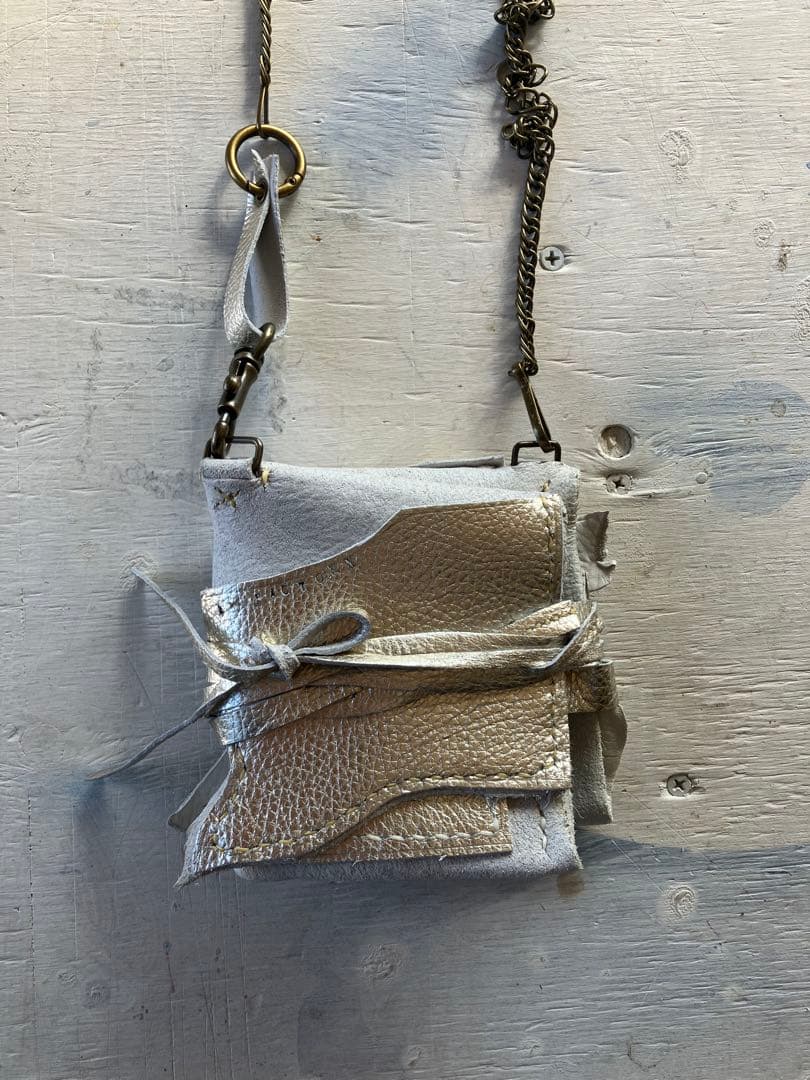 渋金革紐巻く二つ折りたたむネックウォレット＋zipperケース