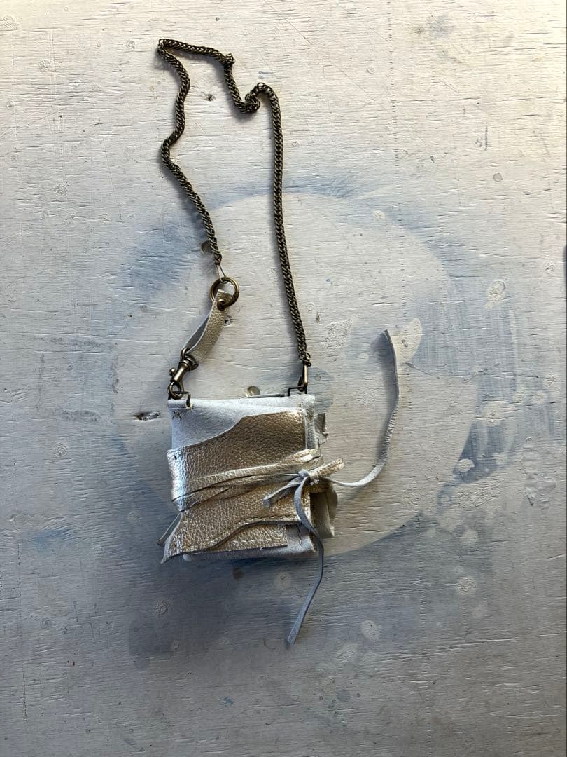渋金革紐巻く二つ折りたたむネックウォレット＋zipperケース