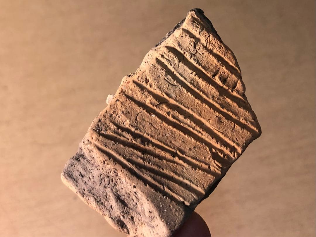 板状土偶の破片」です。