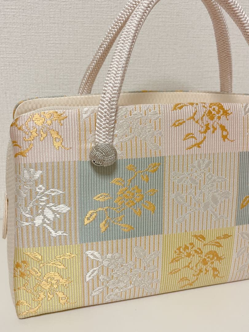 伊と忠利休バッグ