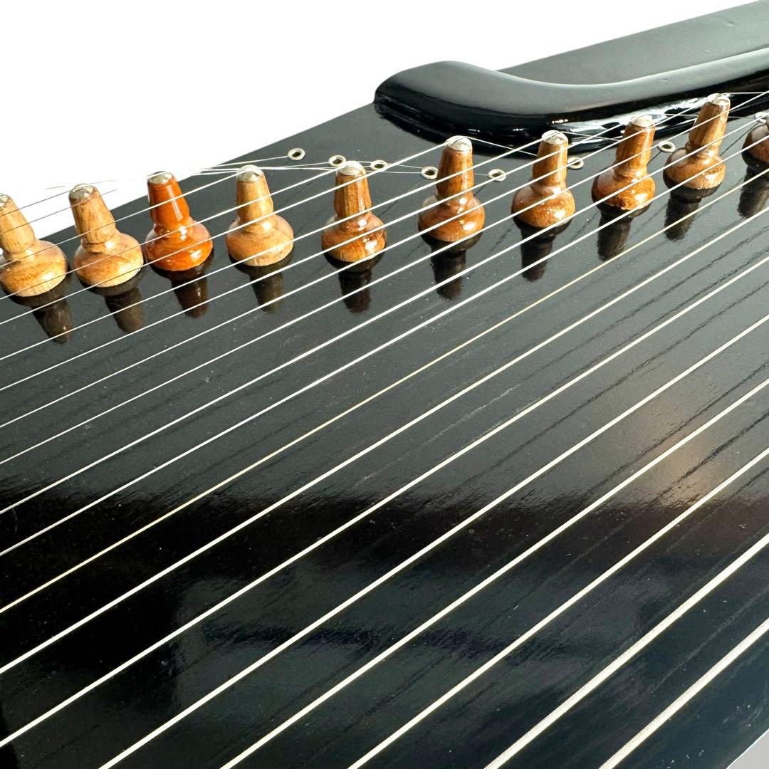 希少】インドネシア 民族楽器 スンダ・シテル 木彫り - メルカリ