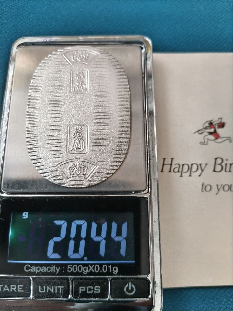 佐川急便 純銀小判（約20,4g）ペーパーホルダー入 - メルカリ