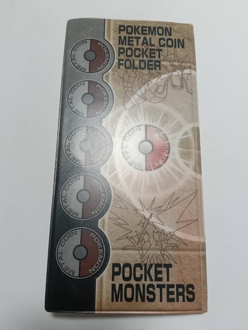 ポケモン メタルコイン フォルダ 40枚 明治 meiji オレンジ30 - メルカリ