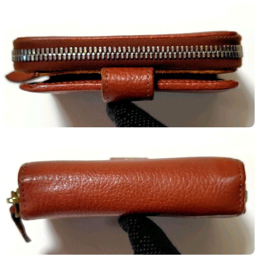 イルビゾンテ折り財布ブラウンレザーラウンドファスナー型押し金ボタン