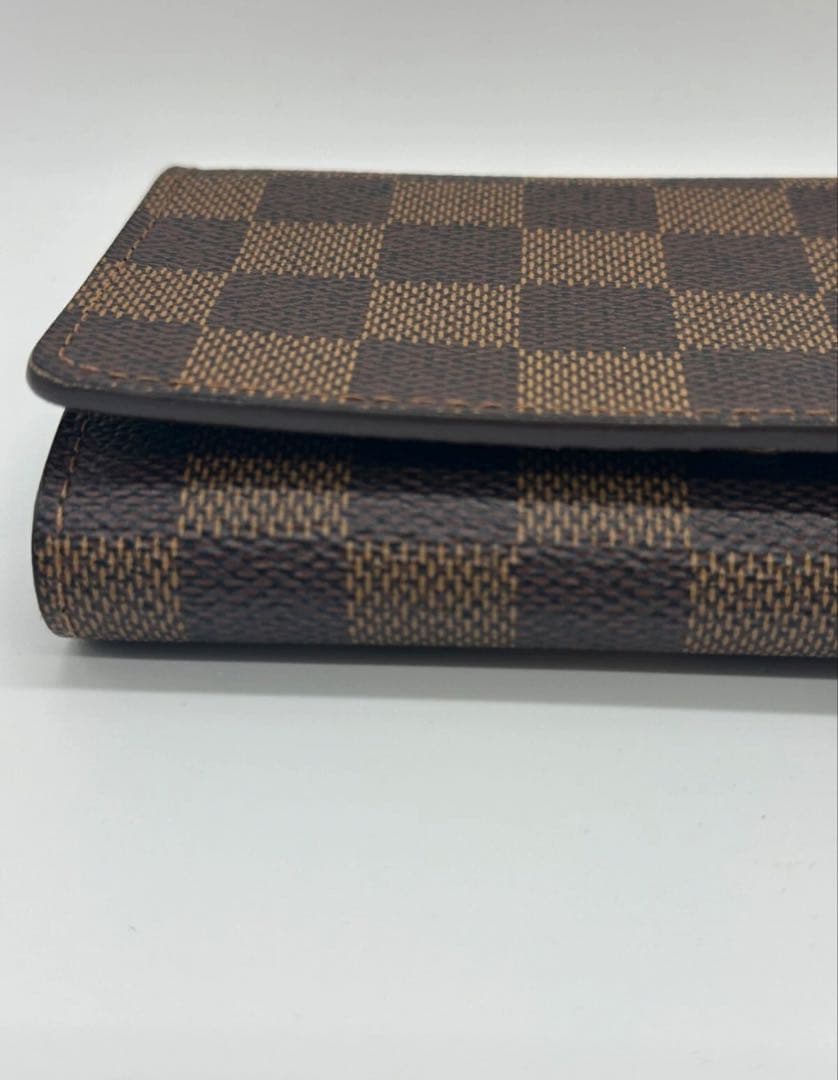 ルイヴィトン ダミエ エベヌ ポルトモネビエ トレゾール 二つ折り財布