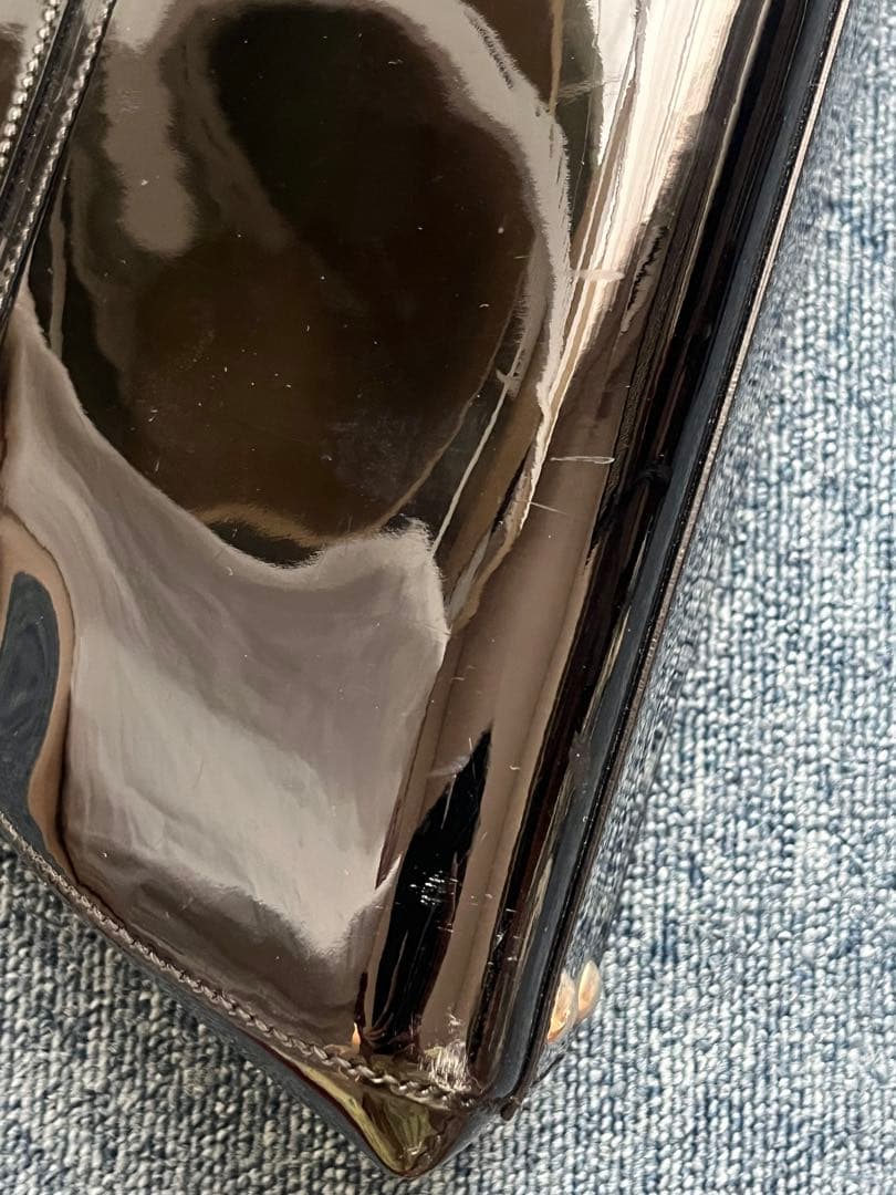 カルティエ　マルチェロ　パンチングロゴ　エナメル　パテント　レザー　ブラック