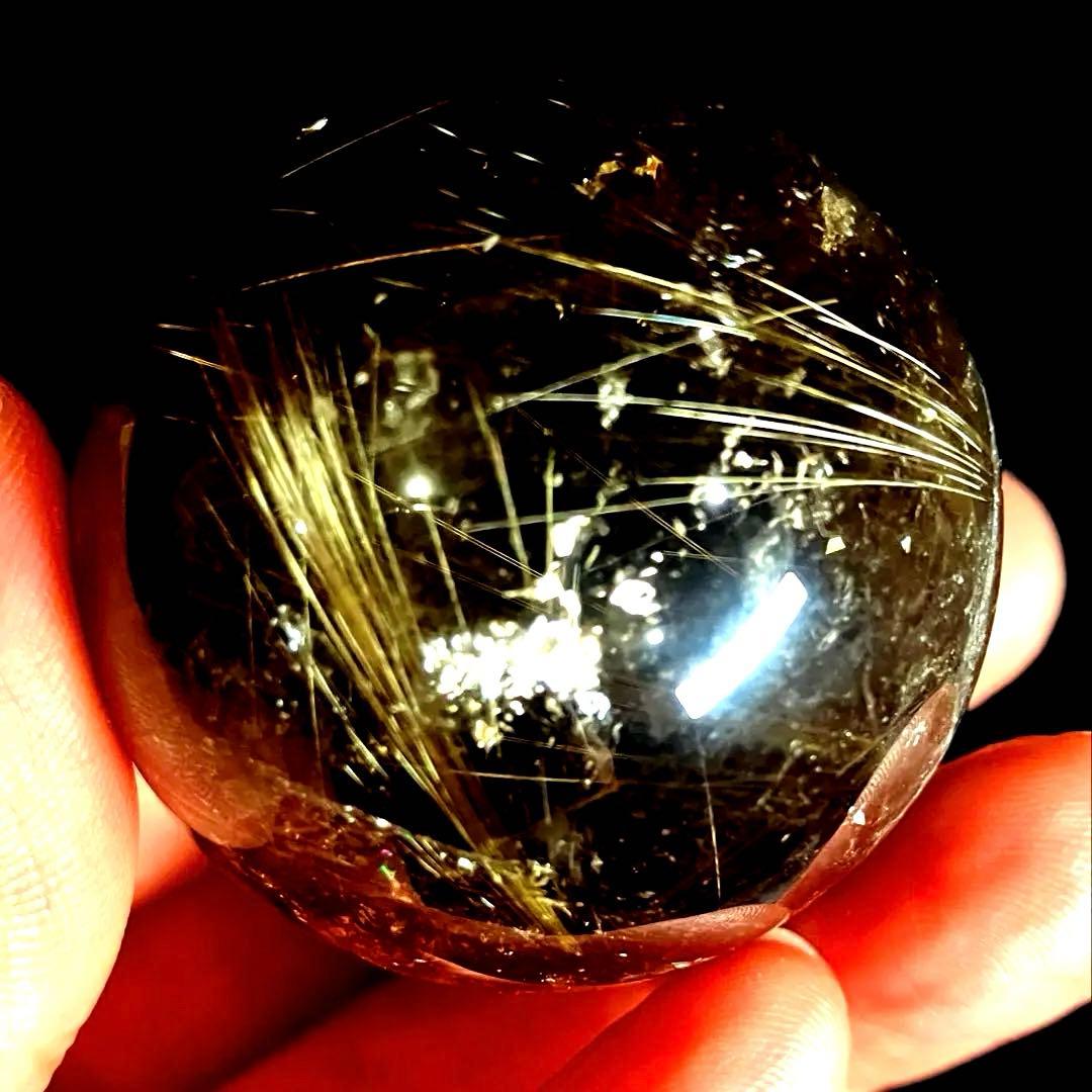 42mm 虹入りゴールドルチルクォーツ 丸玉 スフィア 金針水晶の通販はau