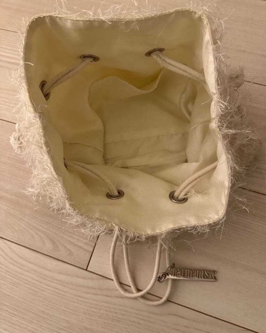 シャルマントサック フリンジ巾着アイボリー - メルカリ